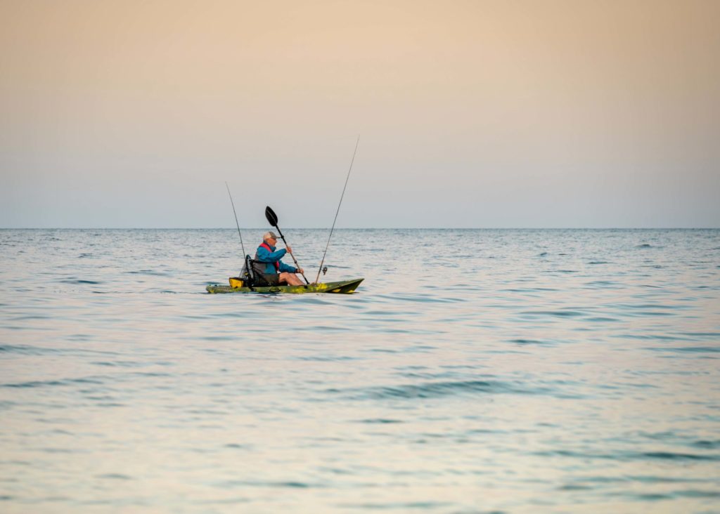 Angler im Kayak